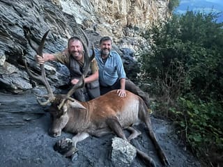 Jäger mit Hirsch.