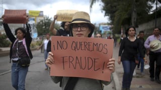 Placat cun il text «Nus vulain nagin fraud!»