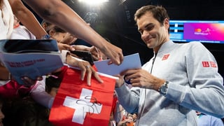 Federer da autograms.