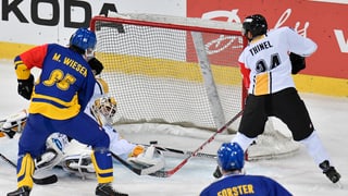 Giugaders da hockey en acziun.