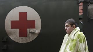 schuldà blessà avant ambulanza