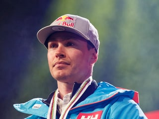 PUrtret Erik Guay cun medaglia. PUrtret Erik Guay cun medaglia.