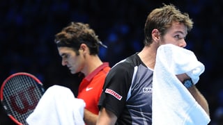 Roger Federer e Stan Warinka durant in gieu il 2014.