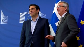 Il president da la cumissiun da l'UE, Jean-Claude Juncker ed il primminister grec Alexis Tsipras 