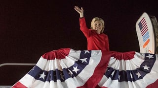 Clinton per ir en l'aviun.