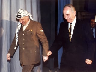 Yassir Arafat e Shimon Peres.