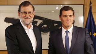 Mariano Rajoy e Albert Rivera suenter la sesida da vart las cundiziuns per ina collavuraziun. 