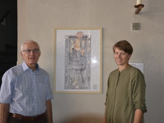 Il president da la plaiv Sep Cathomas e la commembra da la cumissiun Annadora Friberg. 