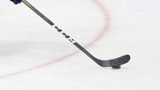 Bastun da hockey sin glatsch.