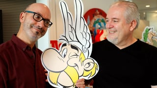 L'autur Jean-Yves Ferri (sanestra) e l'illustratur Didier Conrad. L'autur Jean-Yves Ferri (sanestra) e l'illustratur Didier Conrad.