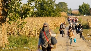 Fugitivs al cunfin da la Serbia e la Croazia.