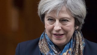 Il maletg mussa la primministra britannica Theresa May