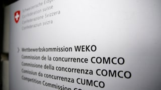 Ina tabla cun scrit si cumissiun da concurrenza CUMCO
