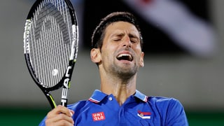Novak Djokovic che ha pers l'emprim gieu dal turnier olimpic ed è uschia out.