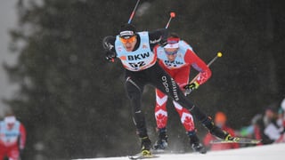 Dario Cologna durant la cursa da 15 km skating a Tavau.