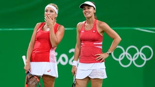 Duas giugadras da tennis.