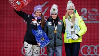 Las skiunzas Tina Maze, Anna Fenninger e Lindsey Vonn cun lur medaglias.