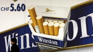Purtret d'ina reclama da cigarettas da Winston sin in placat. 
