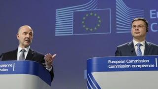 Purtret dals dus commembers da la cumissiun. 