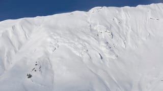 Ina lavina che va a val. 