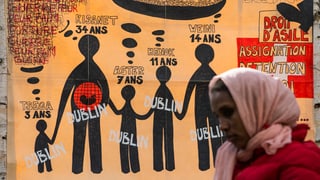 placat cun dessignà ina famiglia