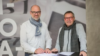 Armin Spescha da communicaziun.ch (san.) e Peter Frangi da Artolino.