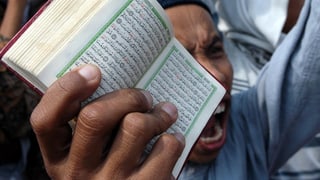In extremist muslim tegn davant sia fatscha in cudesch pitschen.