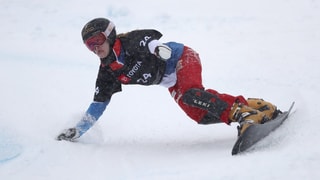 Purtret da Nicole Baumgartner durant ina cursa da slalom parallel. 