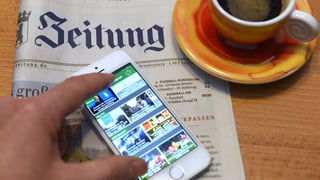 in telefonin sin ina gasetta e dasper in scadiola cafè