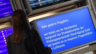 Ina dunna stat davant in visur nua ch'i è scrit ch'i crodia or blers sgols pervi d'ina chauma dals pilots.