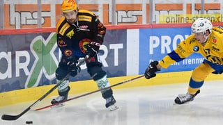 giugaders da hockey en acziun