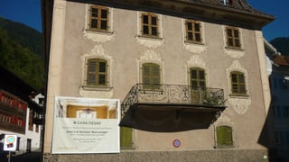 Il placat che fa attent a las abitaziuns en Casa Desax
