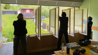 Ina tiradura e dus tiradurs en acziun Ina tiradura e dus tiradurs en acziun