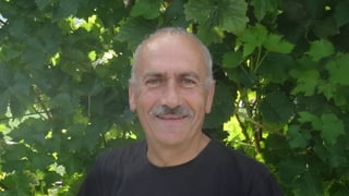 purtret da Hans Jüstrich, cumissari da viticultura.