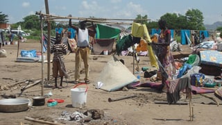 Famiglia en il Sudan dal Sid che sto cumbatter per surviver.