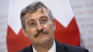 Purtret da Michael Hengartner durant ina conferenza da medias da la Confederaziun.