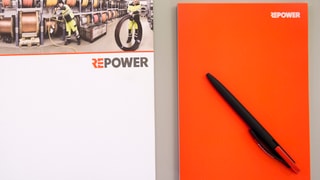 Il logo da la Repower ed ina mappa da medias. 
