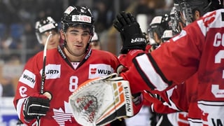 Giugaders da hockey en acziun