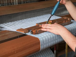 Era la "Tessitura di Valposchiavo" mussa sco che lur products vegnan fatgs.