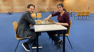 Yannick Pelletier e Lena Georgescu en la sala dal turnier
