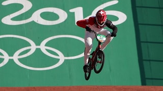 In currider da BMX en acziun cun ses velo