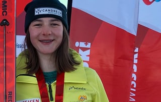 Skiunza, skis, medaglia Skiunza, skis, medaglia