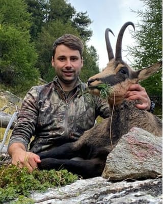 Marco Neuhäusler cun ses buc-chamutsch da 30kg. Sajettà a Susch.