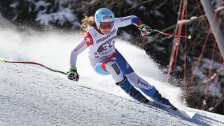 Purtret da Jasmine Flury durant ina cursa da skis. 