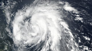 Ina fotografia dal hurican Maria ord il cosmos.