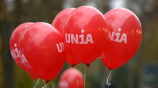 Purtret da balluns cun il logo da l'Unia. 
