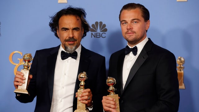 Il reschissur Alejandro Inarritu (sanester) e l'actur Leonardo DiCaprio.