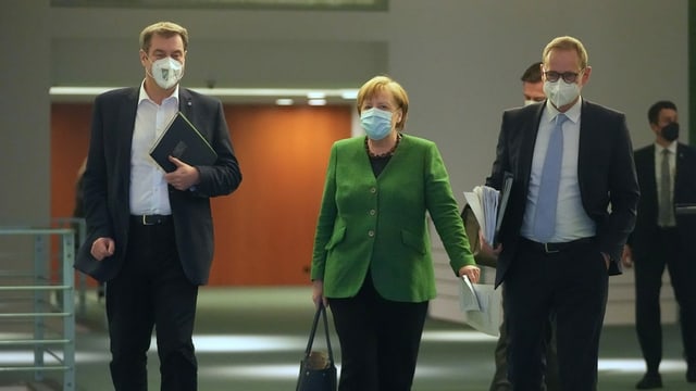 Markus Söder ed Angela Merkel.