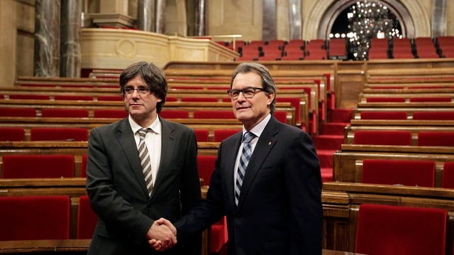 Carles Puigdemont ed Artur Mas, dus politichers catalans.