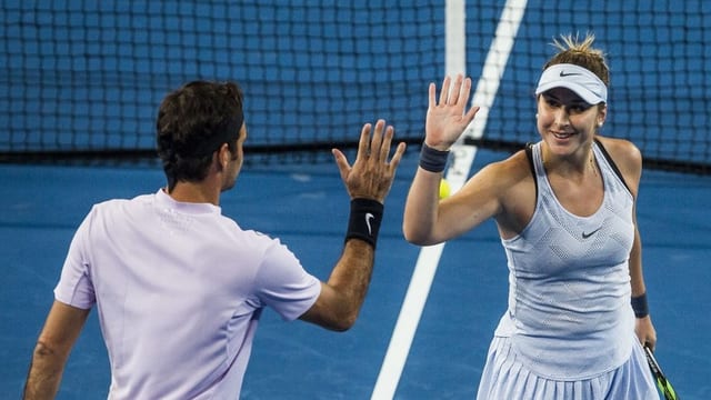 Belinda Bencic e Roger Federer.